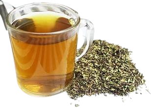 A steaming cup of mountain herbal tea with dried herbs and fresh mountain flowers