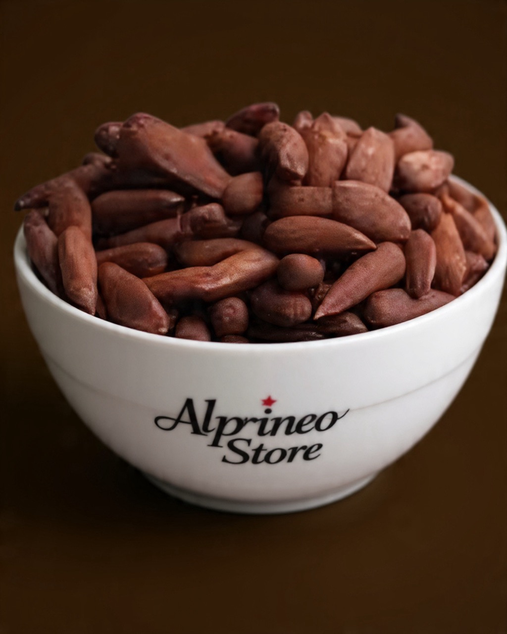 Chalgoza — Traditional Instrument A traditional Chalgoza with its carved body and mouthpiece resting on a fabric backdrop.