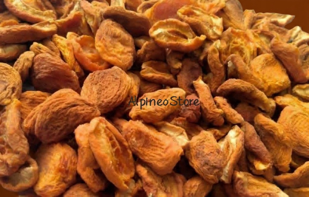 Dry Apricot: Quiet Harvest A close-up of a dry apricot, its wrinkled skin and warm orange tones catching soft light, evoking rustic simplicity.